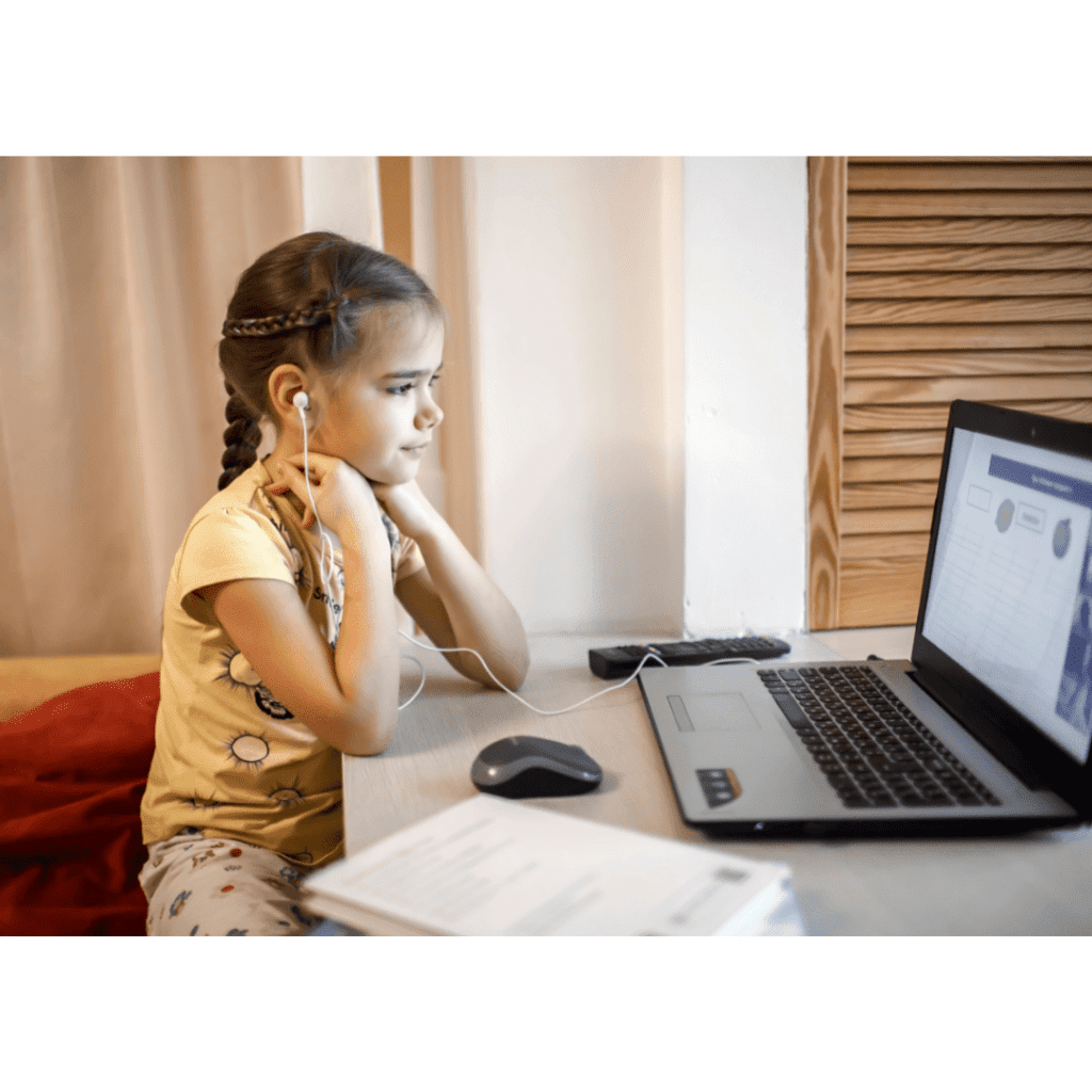 A little brunette girl work on a Connect Teletherapy Online Speech Therapy session.